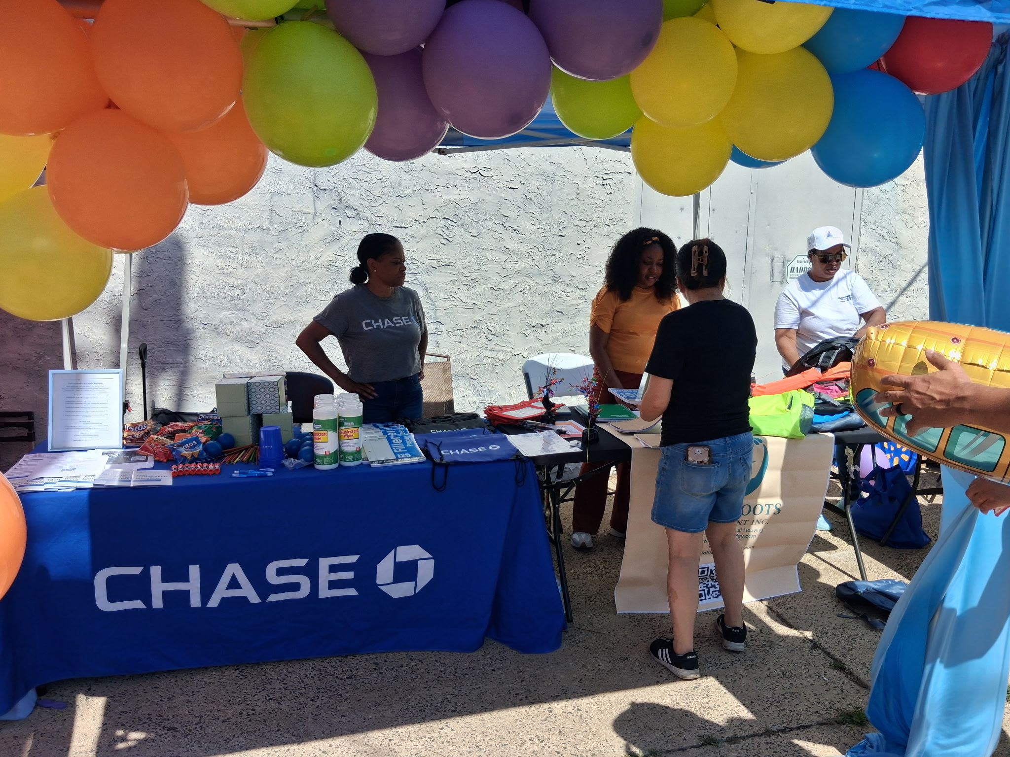 Chase Bank and Urban Roots Development community resource table at the Community Awareness & Safety Day